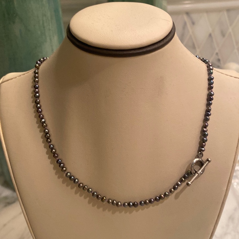 Black pearl necklace with silver toggle closure